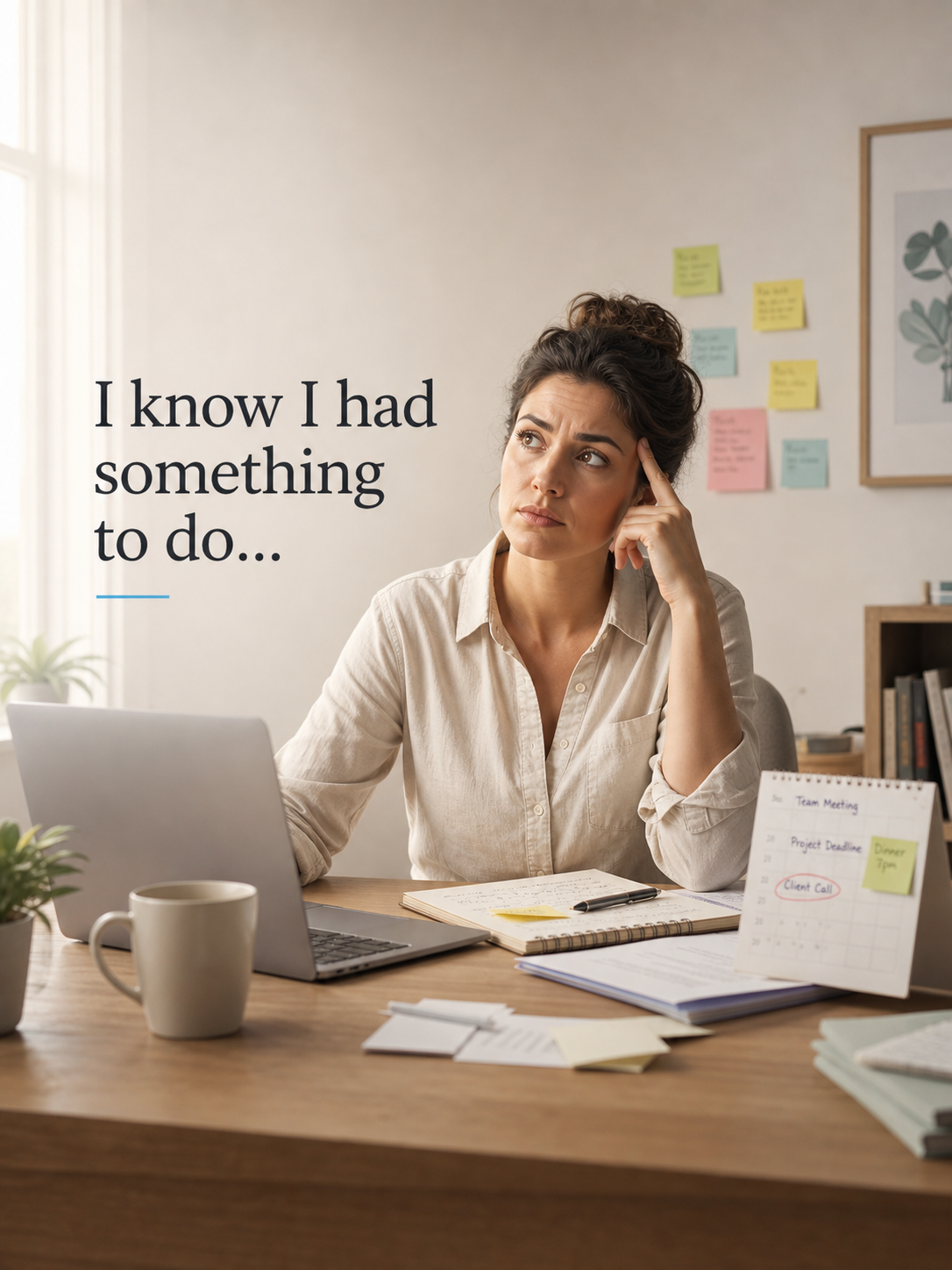 A woman at her desk trying to remember something she needed to do.